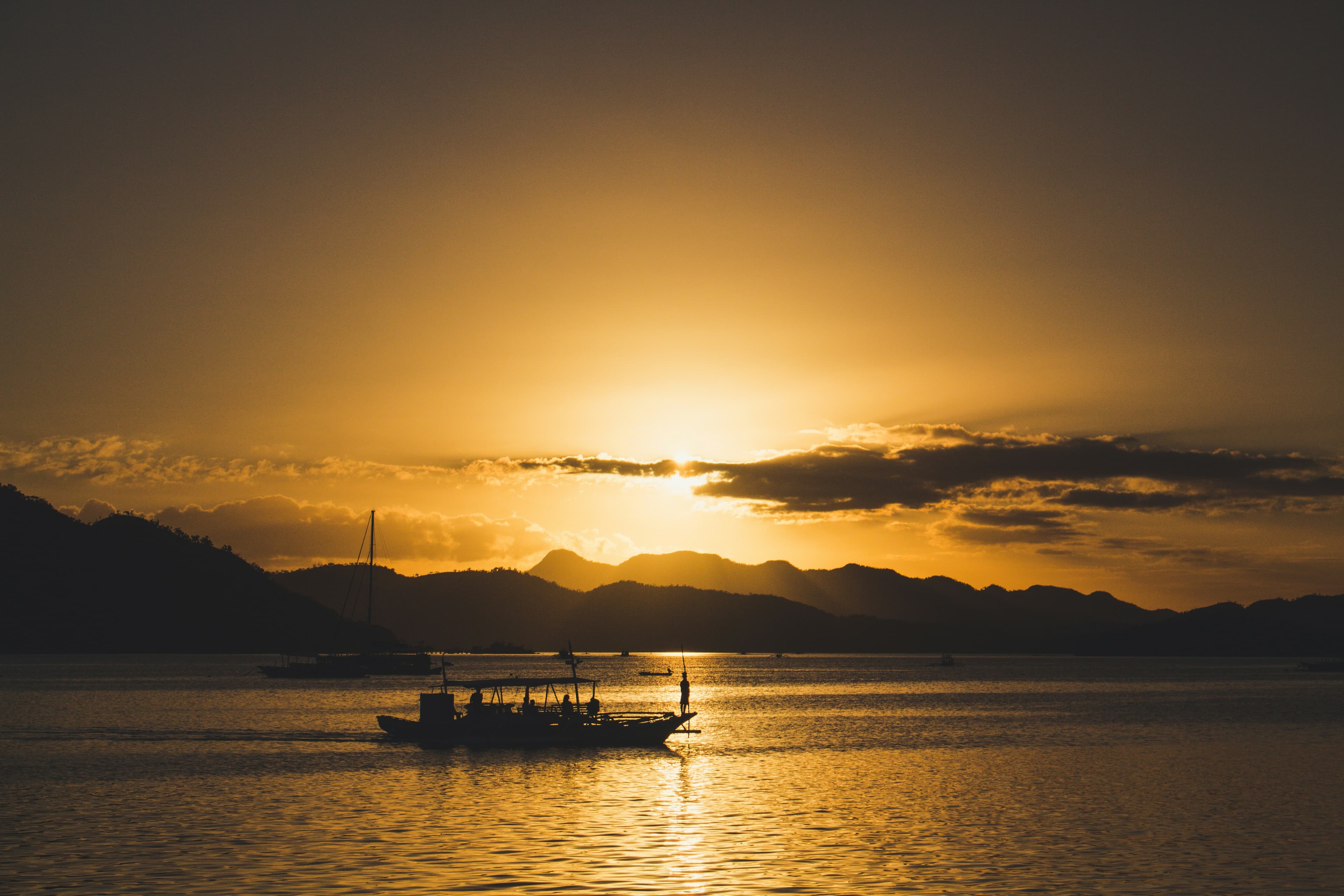 Sunset beach with boat